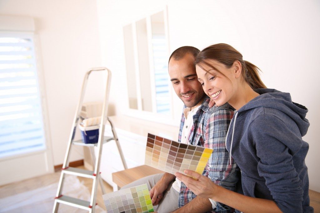 Couple choosing a new house color