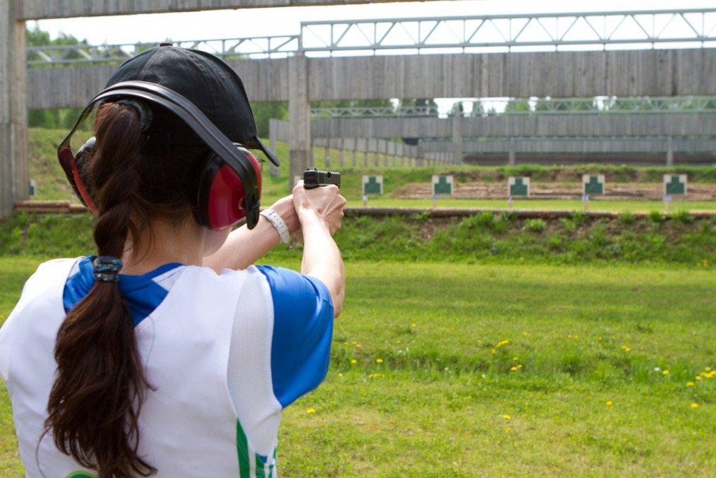 Woman at a shooting range