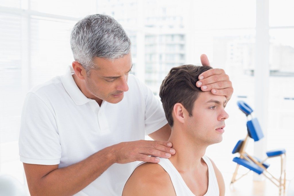 Man getting chiropractic treatment