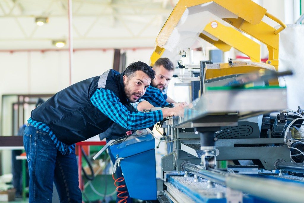 workers in a manufacturing facility