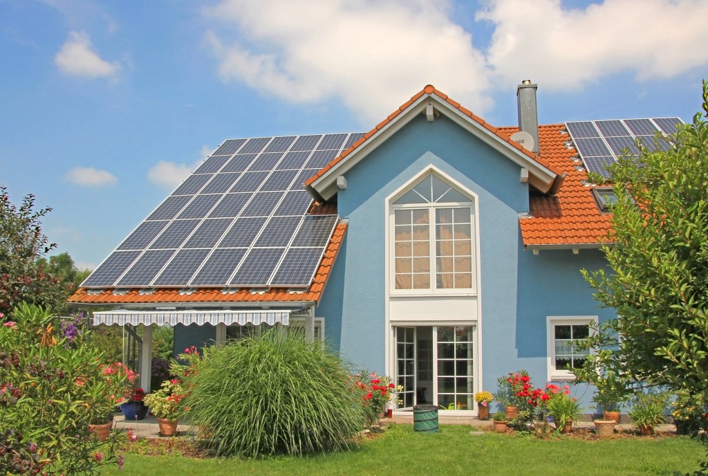 house with solar panel roofs