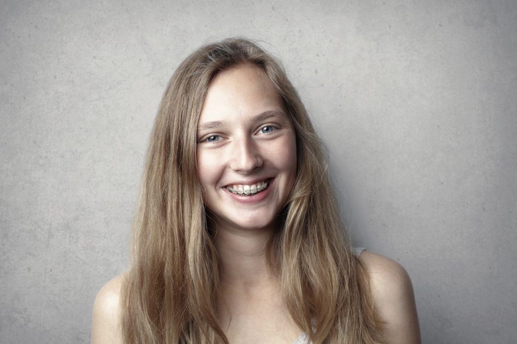 woman with braces on her teeth