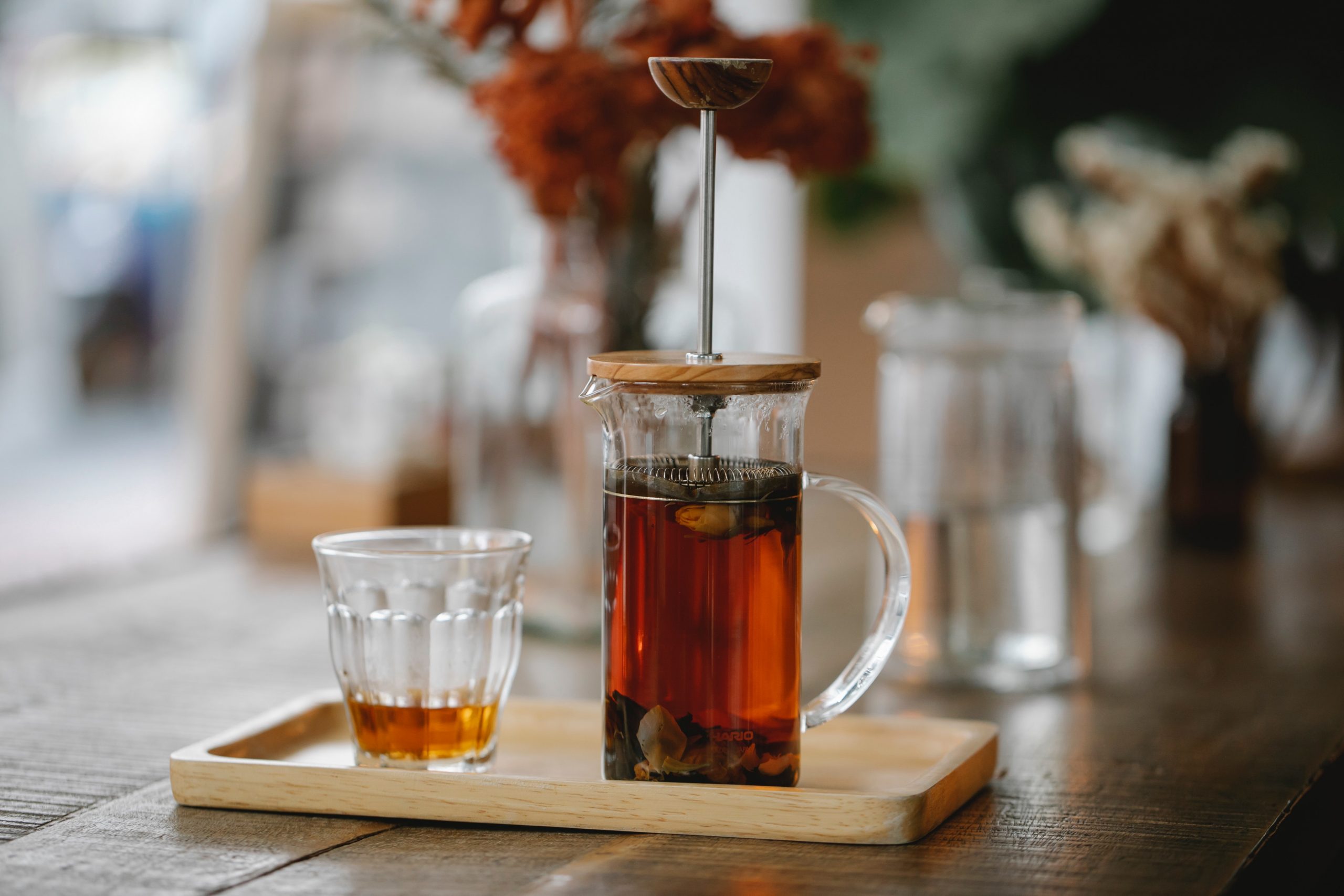 Hot herbal tea brewing in French press