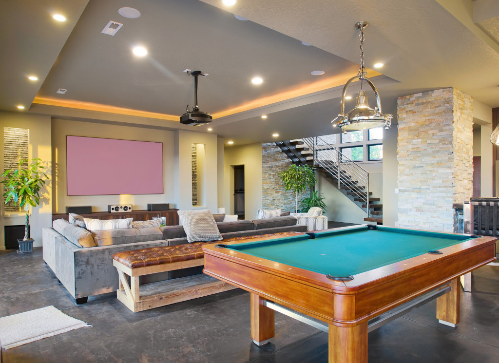 Luxury home living room with pool table 