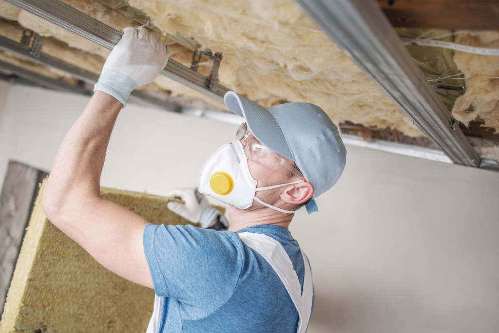 Wall insulation installed by man