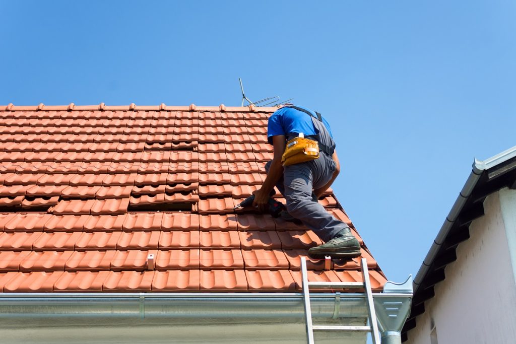 a man doing roof work